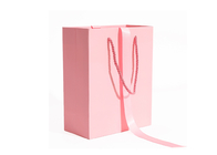 Sac de papier à provisions de sous-vêtements roses romantiques de logo fait sur commande avec des poignées de corde